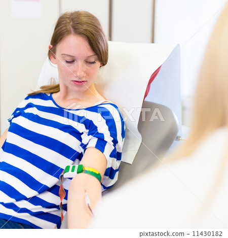 Blood donor at donation. Blood donor at donation. 11430182