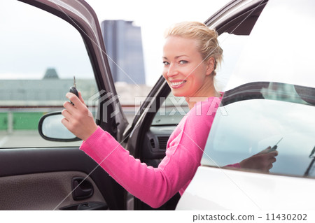 Woman driver showing car keys. Woman driver showing car keys. 11430202