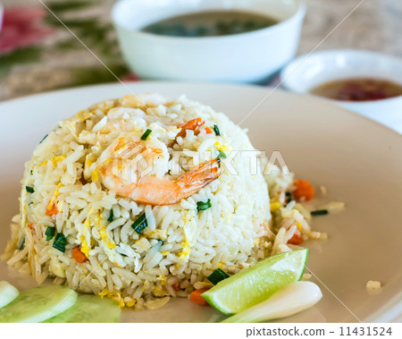 Unique style Thai shrimp fried rice serves on the dish Unique style Thai shrimp fried rice serves on the dish 11431524