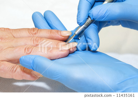 woman doing manicure beauty salon 11435161