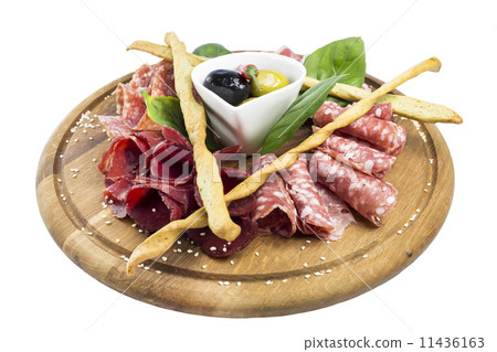 plate of sausages and bacon sauce on a table in a restaurant plate of sausages and bacon sauce on a table in a restaurant 11436163