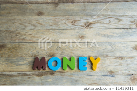 Colorful wooden word Money on wooden floor3 Colorful wooden word Money on wooden floor3 11439311