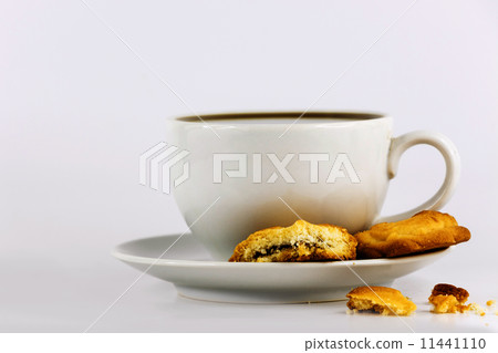 white cup of coffee with cookies white cup of coffee with cookies 11441110