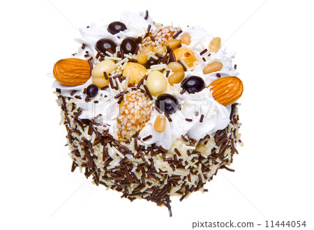 Cake with nuts and whipped cream on a white background 11444054
