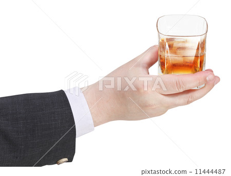 whiskey glass in businessman hand 11444487
