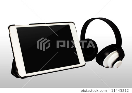 Tablet PC and Headphones isolated on white background Tablet PC and Headphones isolated on white background 11445212