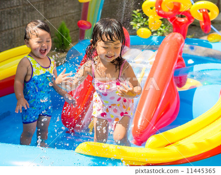 Children playing at home pool Children playing at home pool 11445365