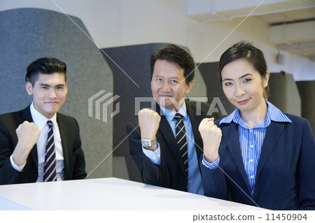 Confident Asian Business Team saying "You can do it!" Confident Asian Business Team saying "You can do it!" 11450904