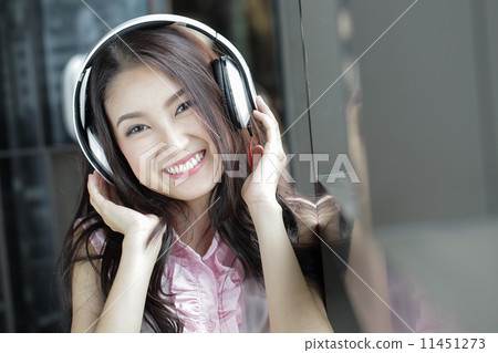 Young Asian woman enjoy 11451273