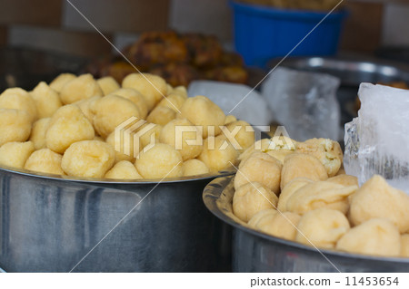 Close-up of vadas in containers at stall Close-up of vadas in containers at stall 11453654