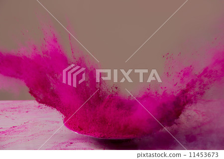 Pink color powder splashing during Holi festival 11453673