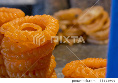Close-up of delicious jalebis for sale Close-up of delicious jalebis for sale 11453695