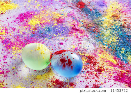 Water bombs and colorful powder during Holi festival 11453722
