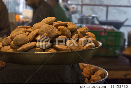 Delicious kachoris on display in store Delicious kachoris on display in store 11453780