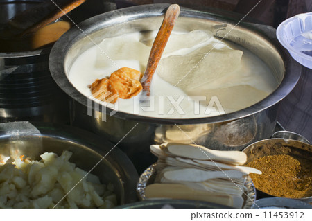 Yogurt and ingredients in containers 11453912