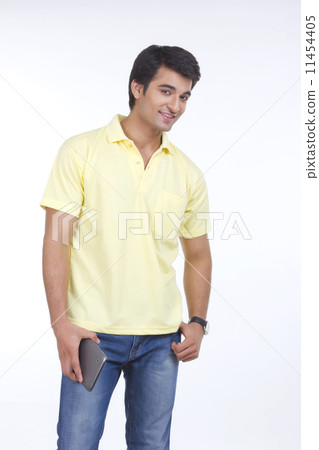 Portrait of handsome young man holding tablet computer isolated on white background 11454405