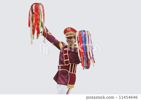 Portrait of a bandwala holding jhunjhunas Portrait of a bandwala holding jhunjhunas 11454646