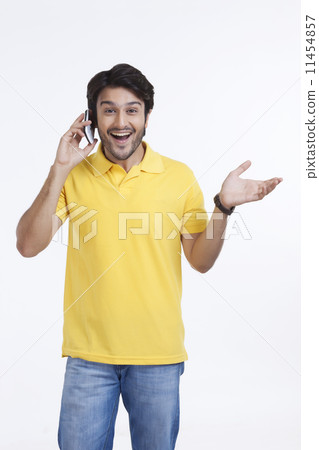 Young man talking on mobile phone 11454857