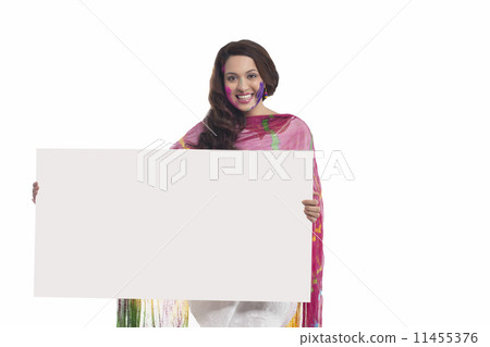 Portrait of a woman holding a white board Portrait of a woman holding a white board 11455376