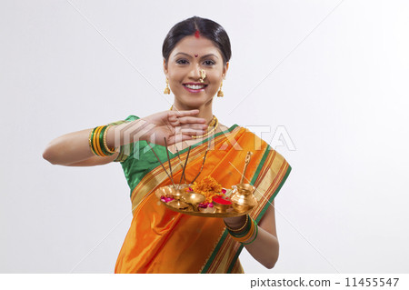 Portrait of a Maharashtrian woman holding a puja thali 11455547