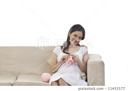 Pregnant woman knitting Pregnant woman knitting 11455577