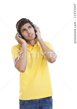 Young man listening to music 11455947