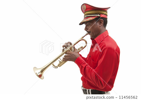 Bandmaster playing on a trumpet 11456562