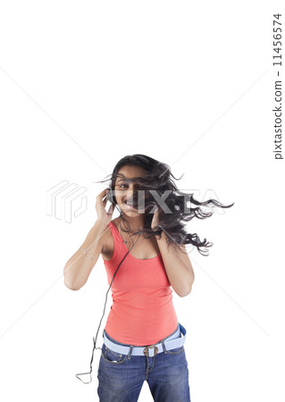 Portrait of a woman with headphones Portrait of a woman with headphones 11456574