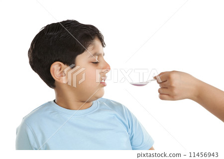 Little boy having medicine Little boy having medicine 11456943