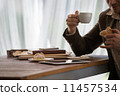 Businessman using tablet computer cafe 11457534