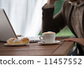 Businessman working cafe laptop 11457552