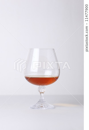 Glass of brandy 11477900