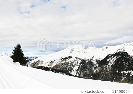 skiing run on snow mountains in Alps 11490094