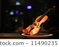 wooden violin with dark background 11490235