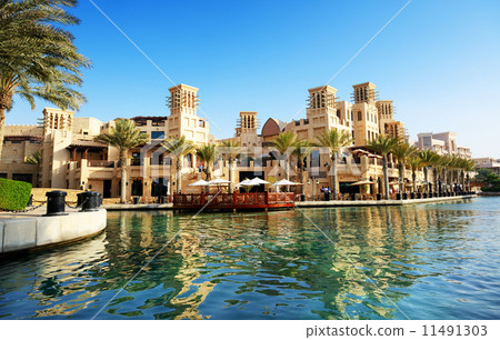 DUBAI, UAE - SEPTEMBER 9: View of the Souk Madinat Jumeirah. Madinat Jumeirah encompasses two hotels 11491303