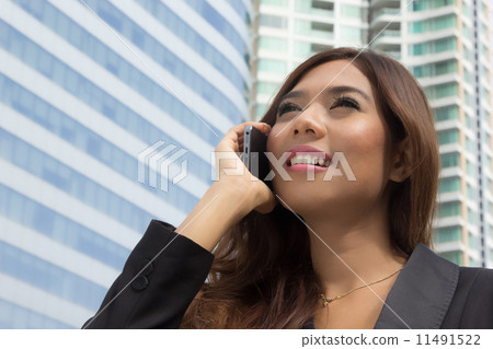 Business woman calling to connect Business woman calling to connect 11491522