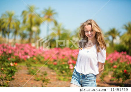 Young girl on a tropical resort Young girl on a tropical resort 11491759
