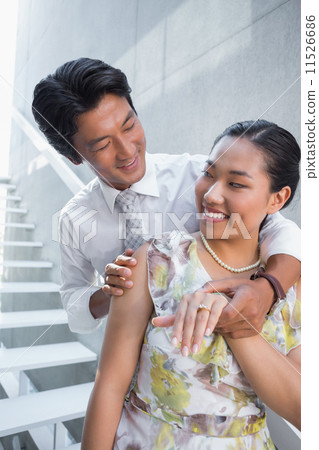 Couple showing engagement ring on womans finger Couple showing engagement ring on womans finger 11526686