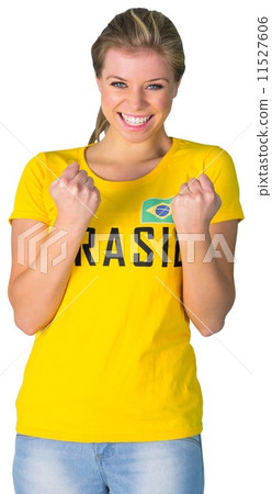 Excited football fan in brasil tshirt 11527606