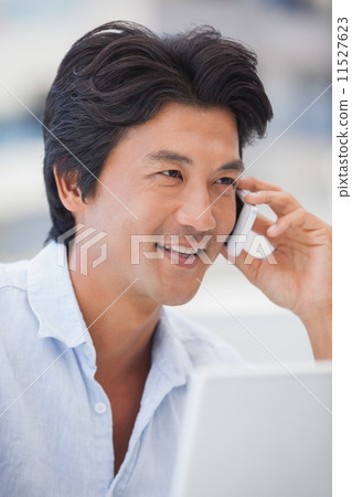 Happy man on a phone call Happy man on a phone call 11527623