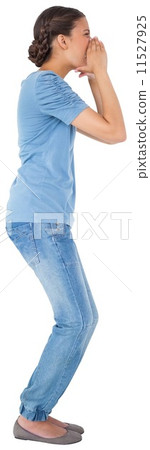 Pretty young casual brunette shouting 11527925