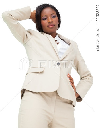 Thinking businesswoman in cream suit 11528822