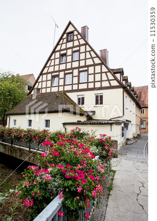 Bavarian house and bridge decorated with flowers Bavarian house and bridge decorated with flowers 11530359