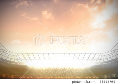 Large football stadium with spotlights under pink sky Large football stadium with spotlights under pink sky 11533765