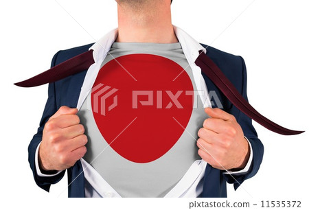 Businessman opening shirt to reveal japan flag 11535372