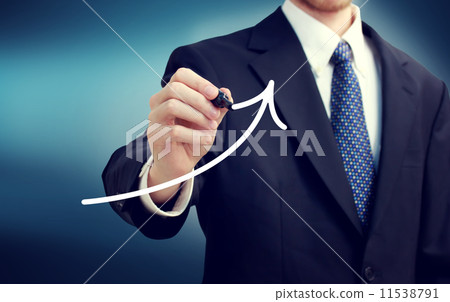Businessman writing an arrow Businessman writing an arrow 11538791
