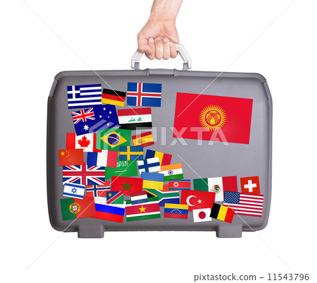Used plastic suitcase with stickers Used plastic suitcase with stickers 11543796