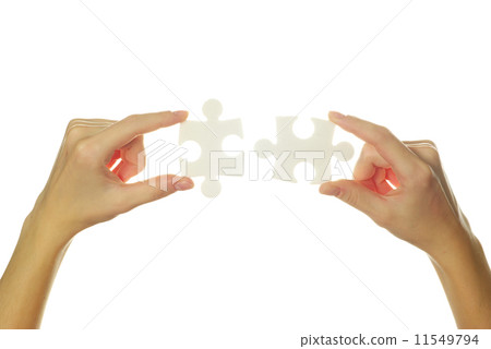 puzzle in hands 11549794
