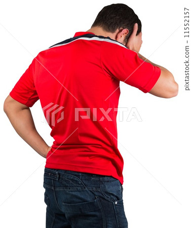 Disappointed football fan in red Disappointed football fan in red 11552157