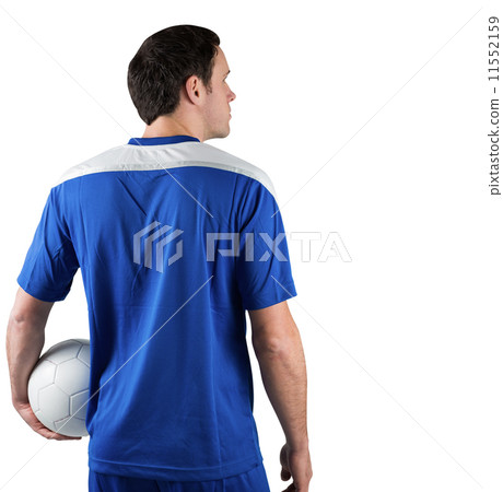 Football player in blue holding ball 11552159